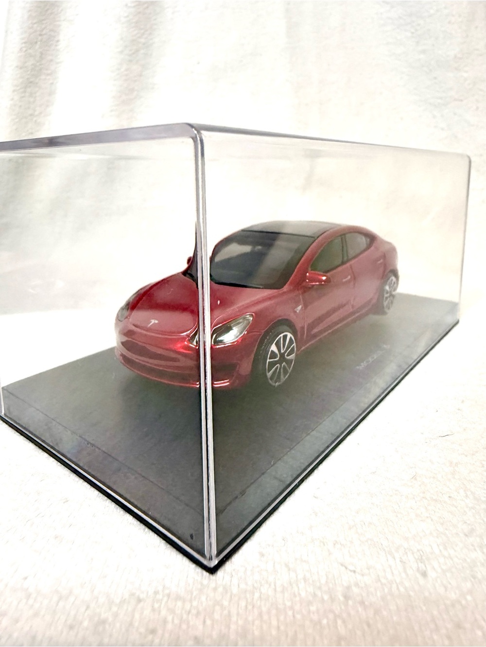 Tesla Model 3 Car in Display Case